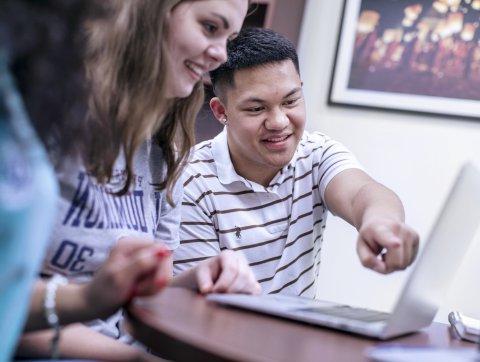 Students working at a computer